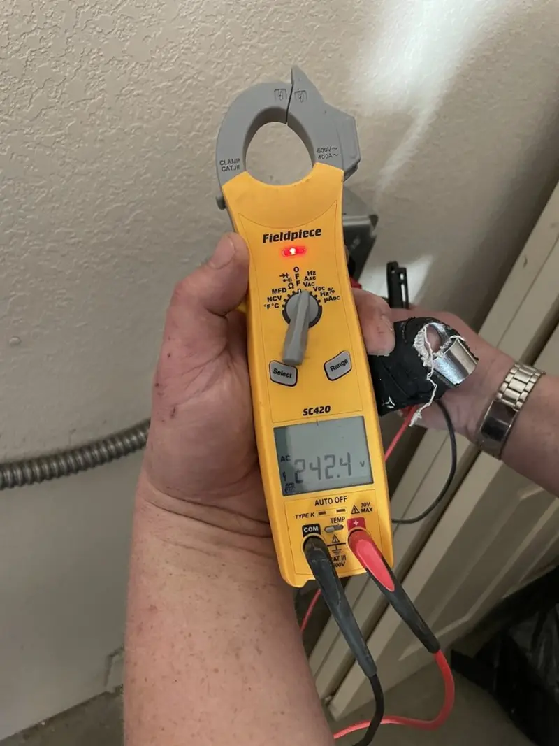 Voltage testing with clamp meter during Aluminum Wiring Replacement in Wadsworth